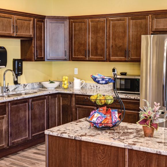Common kitchen with beverages and snacks available around the clock