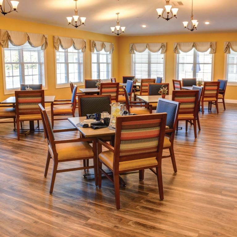 Restaurant style dining with views of the courtyard