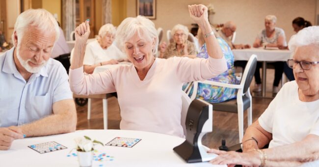 The Courtyard at Oshkosh | Seniors playing bingo