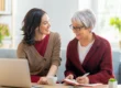 Family member helping senior with finances