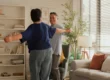 Senior couple dancing in apartment